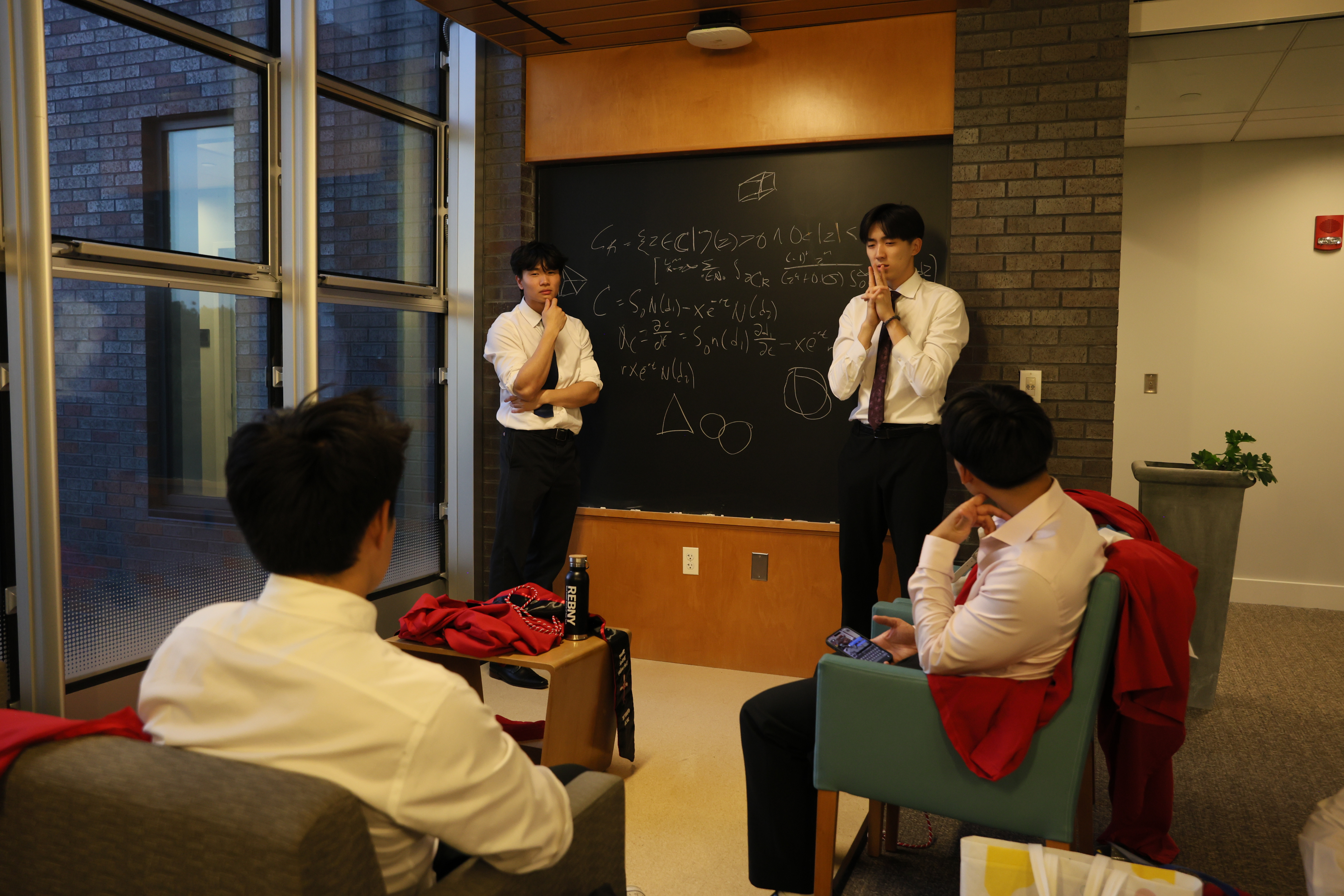 Case competition night, and a blackboard nobody could argue with.