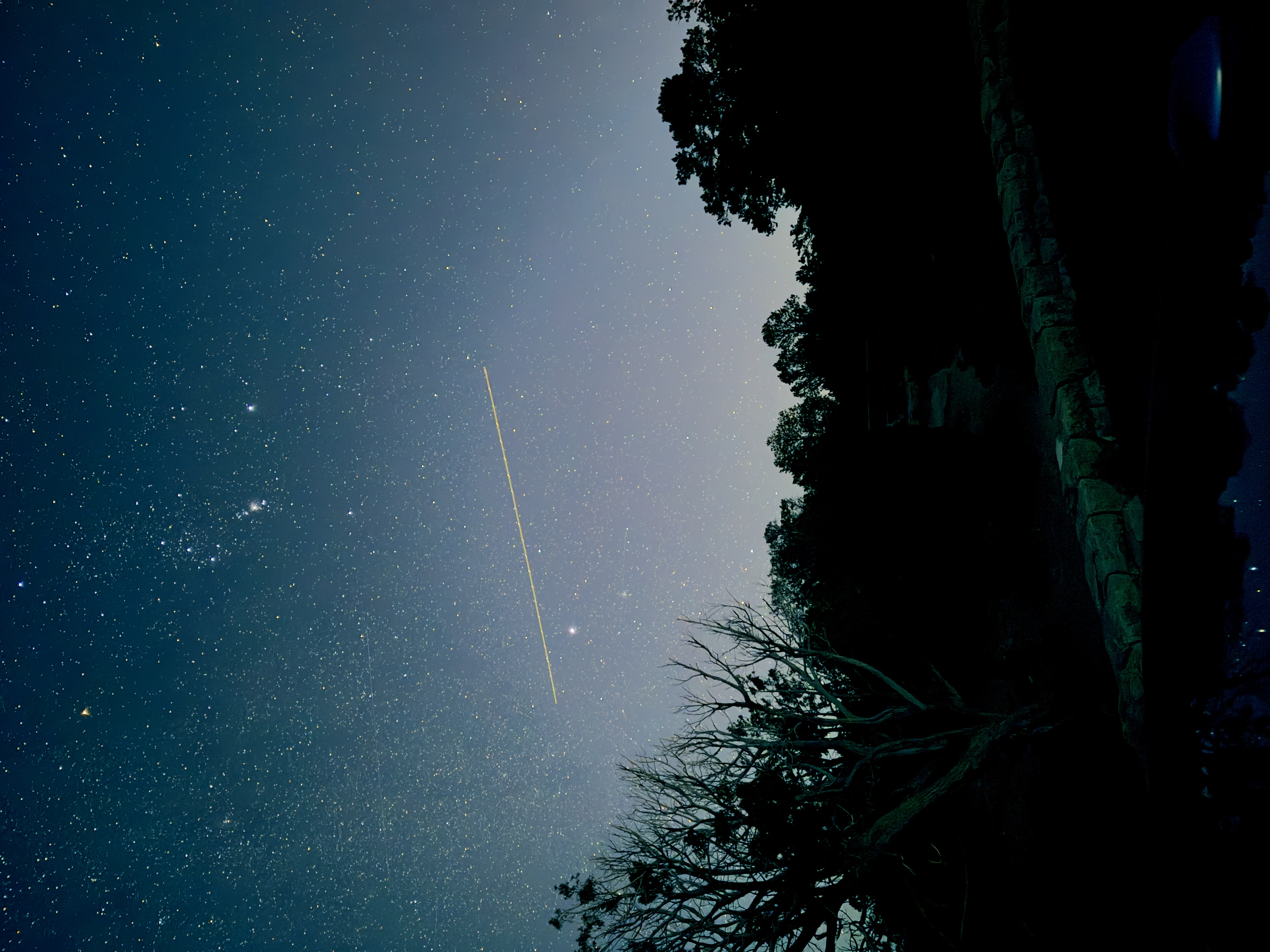 The sky over the canyon rim, long exposure.